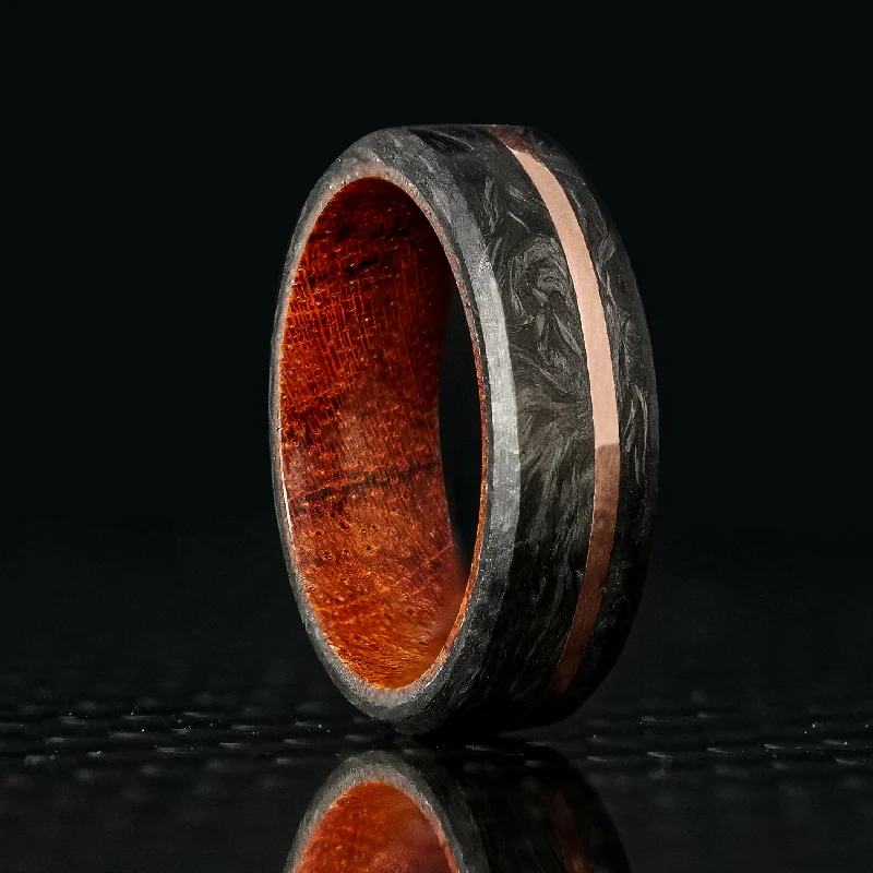 Orchid bloom ring-Forged Carbon Fiber and Gold Ring with Koa Wood Liner